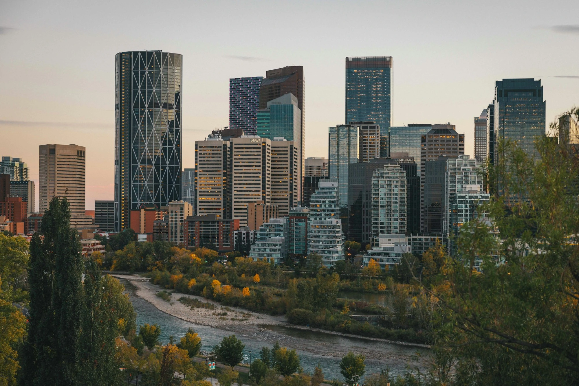 Calgary skyline and Bow River at golden hour
